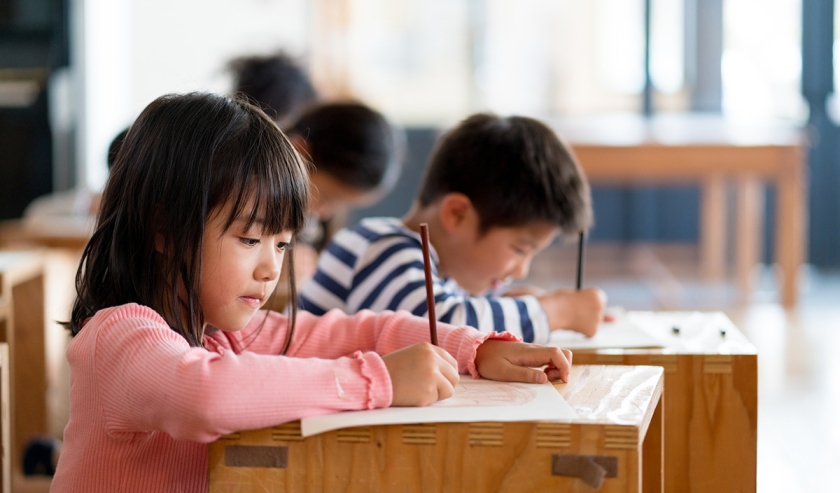 Young group of students in an arts and crafts class