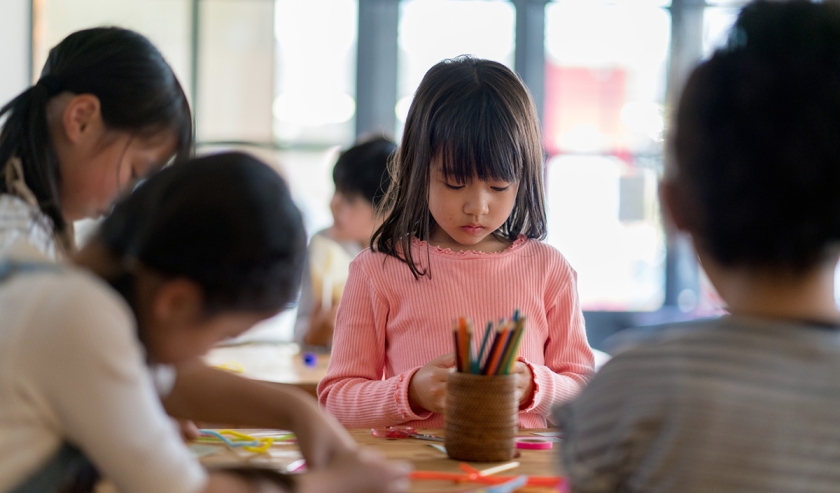 Young group of students in an arts and crafts class