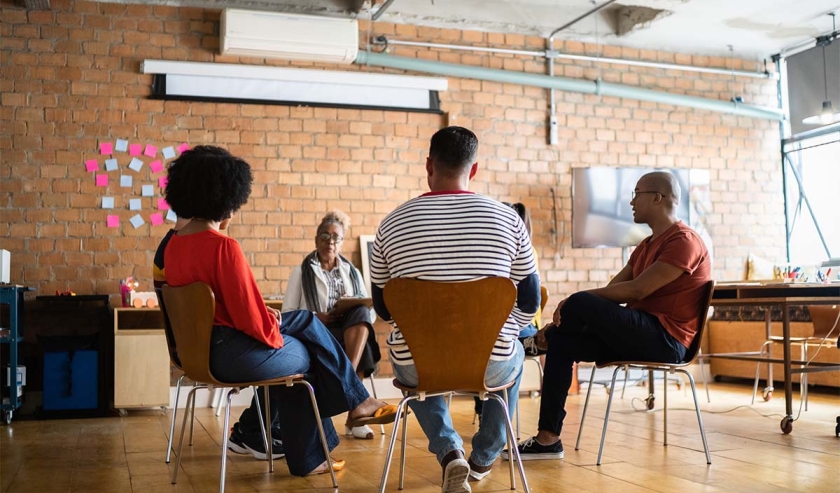 People in group therapy at a coworking