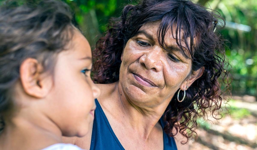 Australian Aboriginal Woman Hugging Her Grandaughter