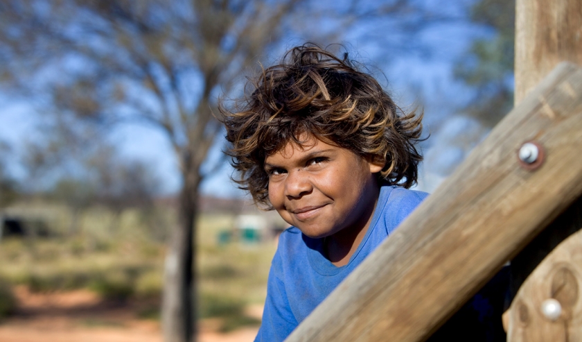 Aboriginal boy outside playing