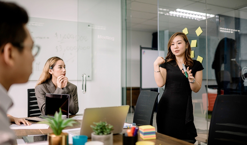 a group of colleague having discussion in meeting room