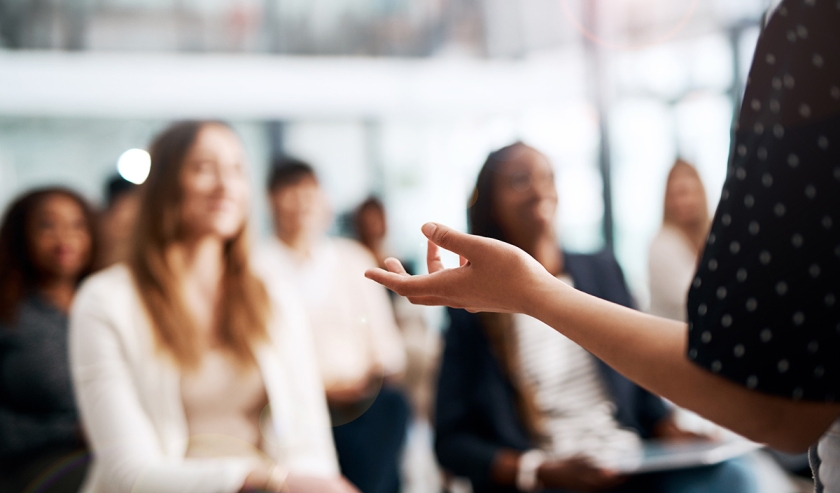 Cropped shot of a businesswoman delivering a speech during a conference