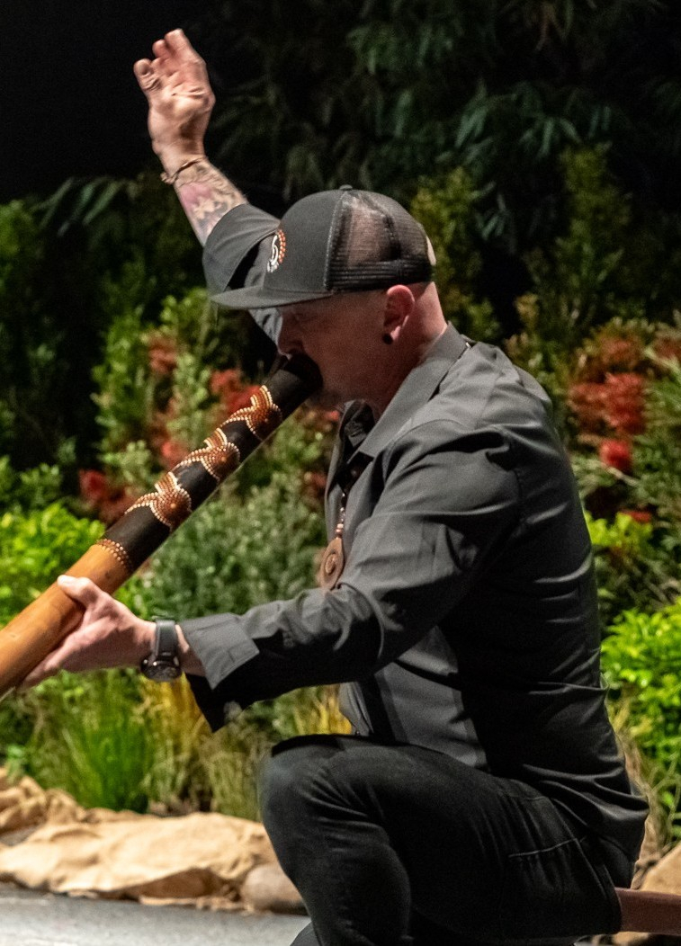 Man playing a digeridu