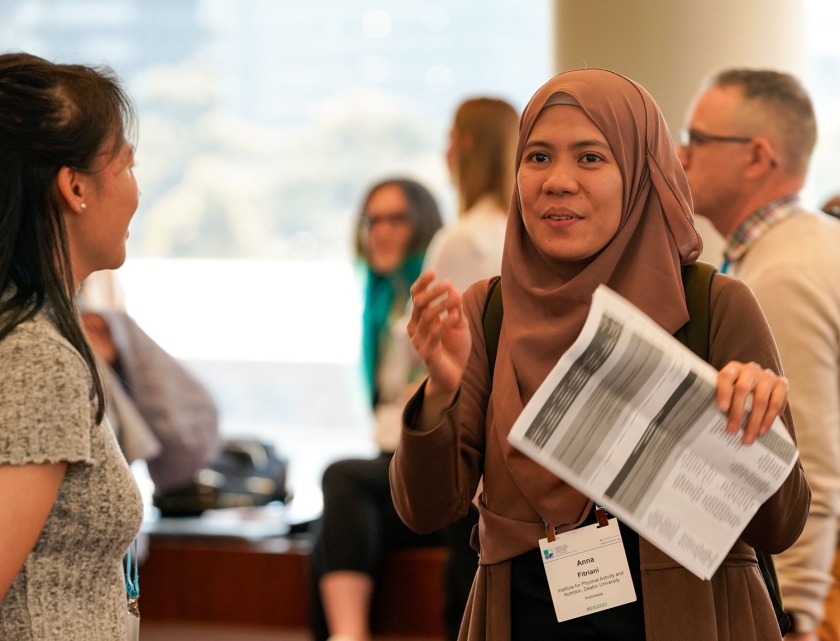 Women chatting at conference